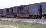 Pandrol Jackson railgrinder with covers down moving into position to start grinding